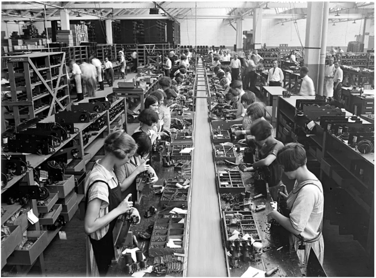 Factory workers in the 1920s.